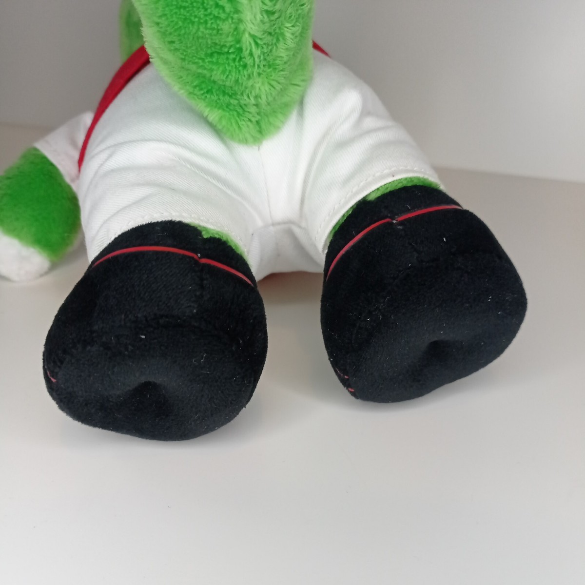 arsenal soccer team green gunnersaurus mascot emoji | AI Emoji Generator