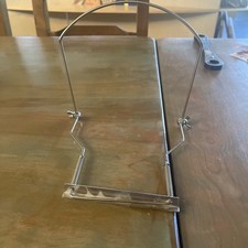 Vintage harmonica holder, neck.