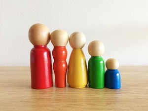 painted wooden peg dolls