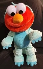 Sesame Street Elmo Dino Stomp Dancing Plush Sings and Talks