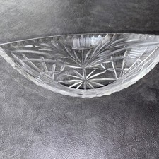 Vintage cut glass crystal bowl with fan and starburst patterns.