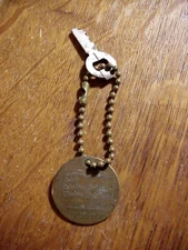 SEAGRAMS WHISKEY 80 Years of Leadership KEYCHAIN with BRONZE FOB