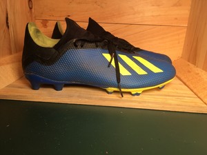 football cleats blue and yellow
