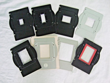 Set of EIGHT Omega Type D Negative Carriers, ALL DIFFERENT, one with glass