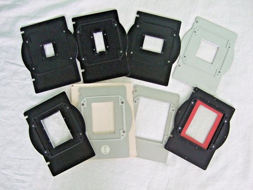 Set of EIGHT Omega Type D Negative Carriers, ALL DIFFERENT, one with glass