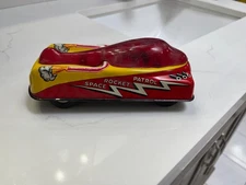 COURTLAND SPACE ROCKET PATROL CAR TIN TOY 1953