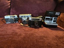 lot of 4 assorted vintage cameras-35 mm Kodak/Polaroid/