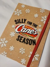 Raising Cane's Silly For The SEASON Notebook