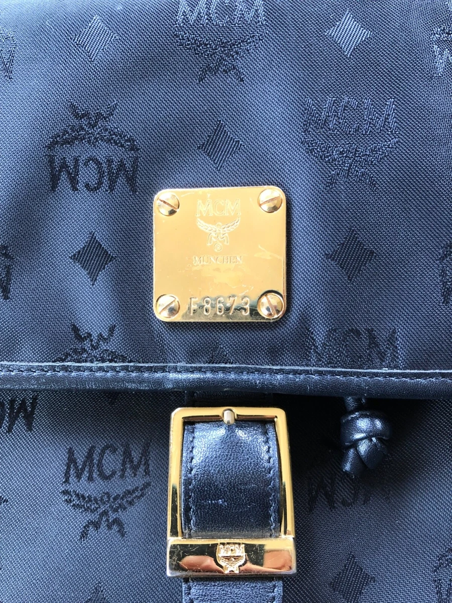 Mcm backpack blue and black sale