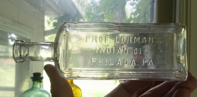 RARE 7 5/8''LARGE SIZE PROF.LORMAN'S INDIAN OIL PHILADA 1880s MEDICINE BOTTLE