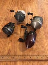 Vintage Lot Of 4 Bait Casting Fishing Reels Zebco 404 & Johnson Century 115 Vintage Lot Of 4 Bait Casting Fishing Reels Zebco 404 & Johnson Century 115 - Image 1