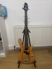 2006 Washburn Taurus T12 Bass Guitar, Natural, Fender gig bag, decent