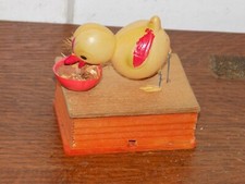 Vintage Celluloid Chicken Feeding in a Grain Basket Toy