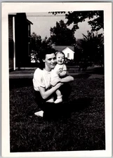 Vintage Snapshot Smiling Woman Holding Baby 1940s