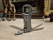 SURVIVALIST STYLE- AWESOME - MULTI-TOOL W/FLASHLIGHT AND 4 TOOLS