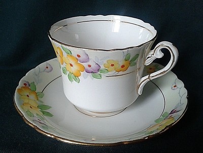 THOMAS FORESTER PHOENIX TEETASSE & UNTERTASSE ART DECO TEE DUO GELB & LILA BLUMEN