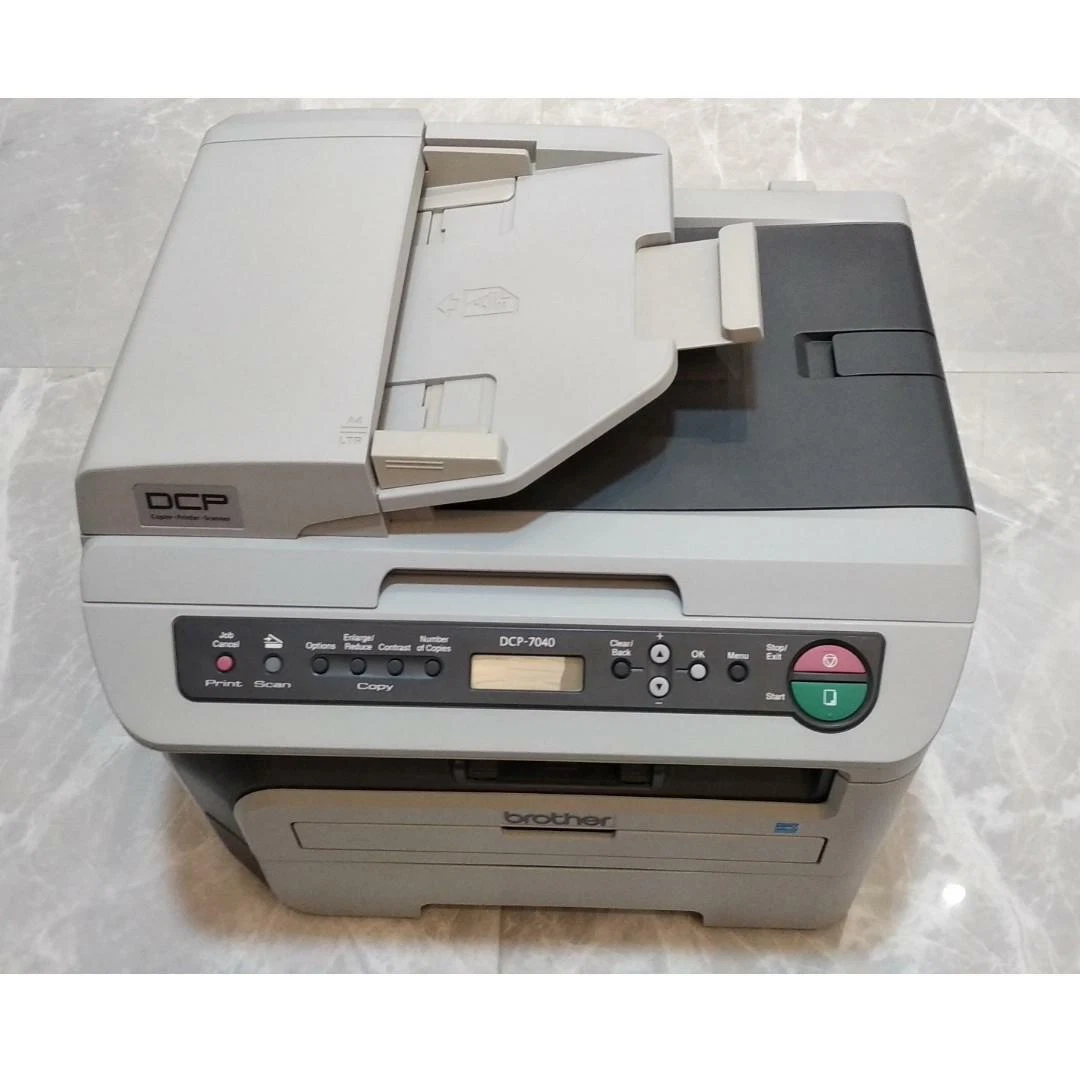 Brother DCP 7040 All In One Laser Printer New Drum Barely Used