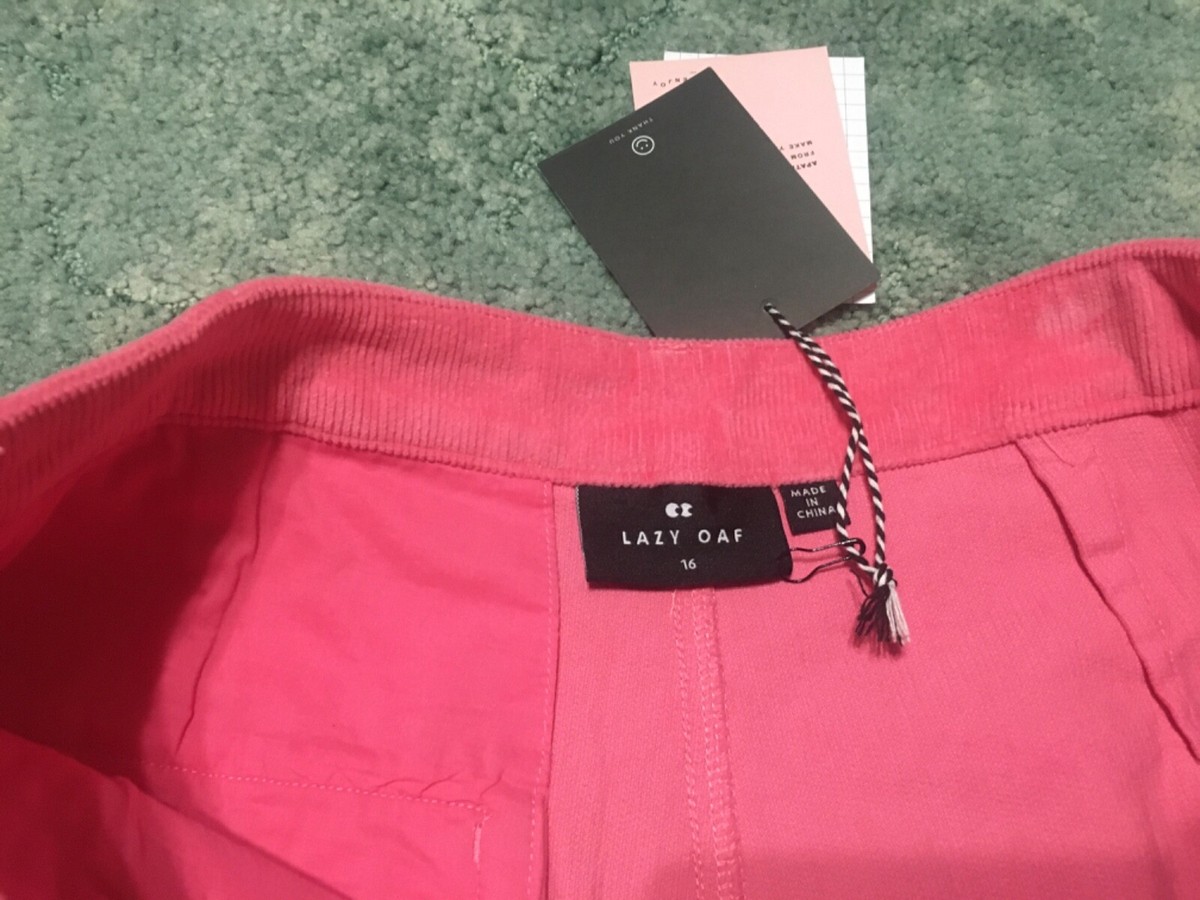 Lazy Oaf Little Kitty pink cord pants with white cat face embroidery