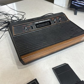 Vintage Atari 2600 Wood grain Console 1980-1982 Working With 8 Games