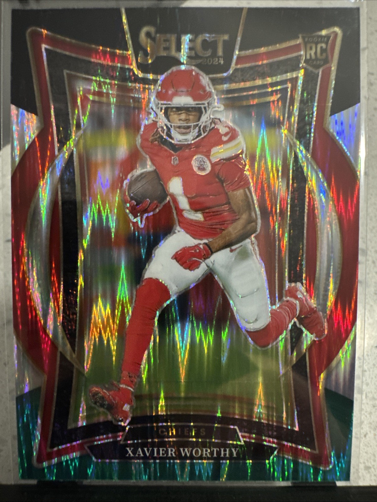 2024 Panini Select - Concourse Xavier Worthy #32 Black & Green Shock Prizm (RC)