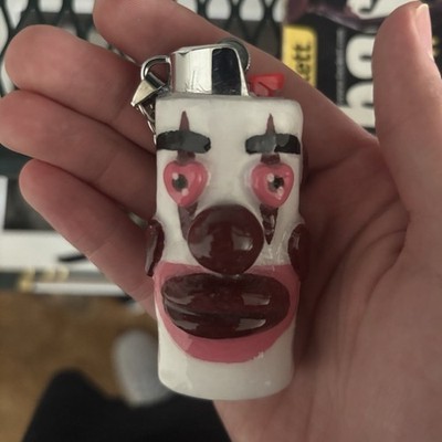 Custom polymer clay lighter case with UV resin coat and metal base
