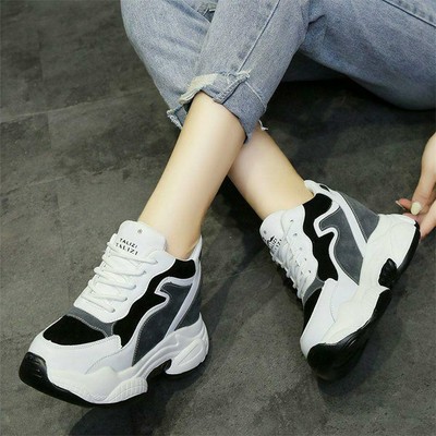 black wedge trainer boots