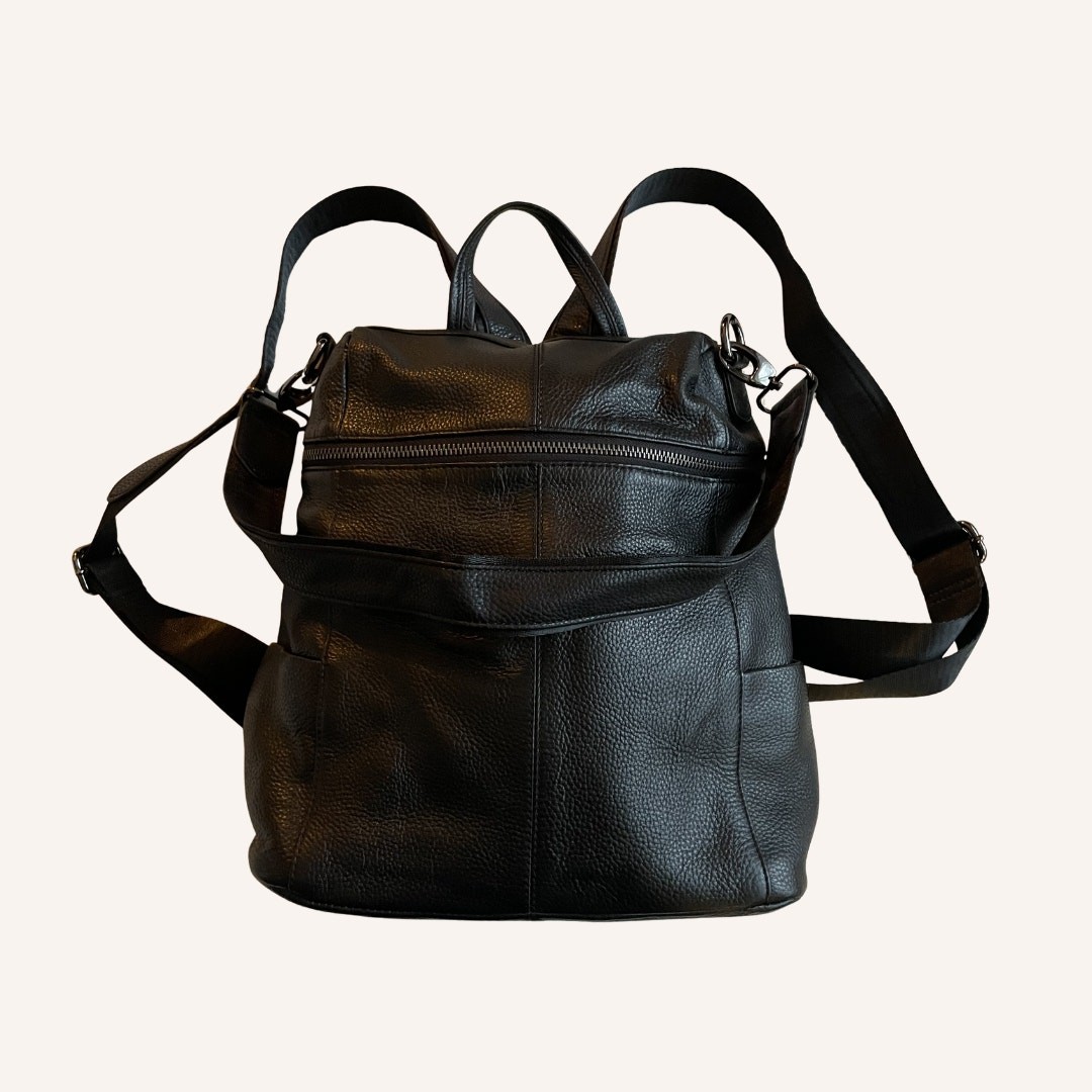 boyatu leather backpack Meleto A fully padded laptop sleeve securely fits 13 and 15 laptops BOYATU Women's Full-Grain Leather Backpack