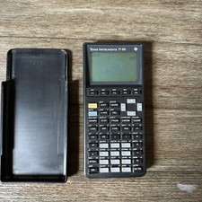 Texas Instruments TI-82 Graphing Calculator With Slide Cover