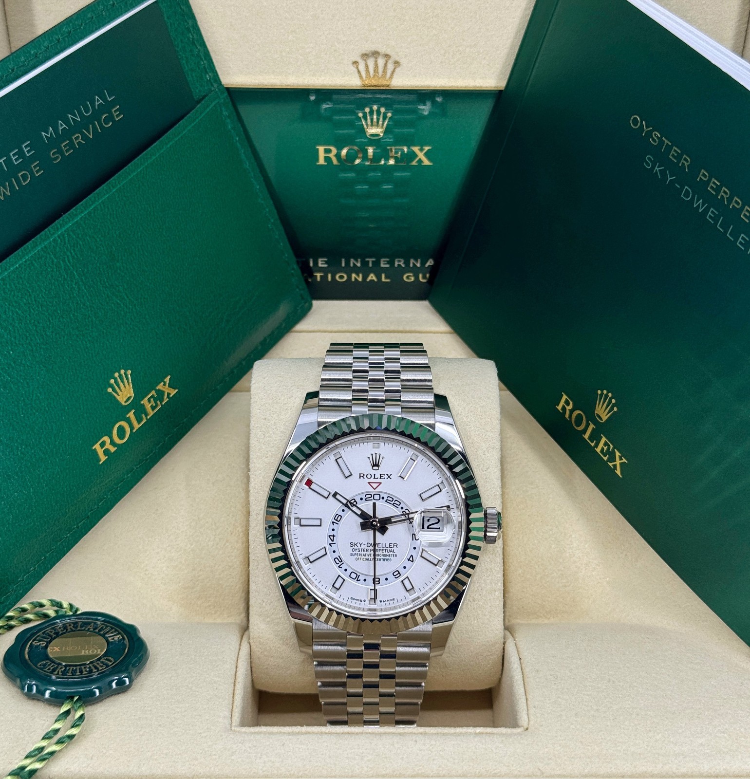 Unworn Rolex Sky-Dweller 42mm, 18k WG & Steel, White, Jubilee, 336934 dated 2025