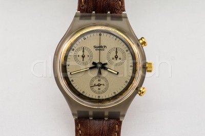 Swatch Chrono 1991 - SCM100 - Goldfinger Variante Zifferblatt Champagner - Neu