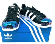 black and iridescent adidas