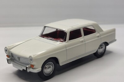 Norev 3-Inch 1/60.   1967 Peugeot 404 white.  NIB 