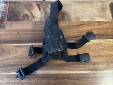 Funda Muslo Safariland 6270-83 Glock 17/22 Zurdo Negra Táctica