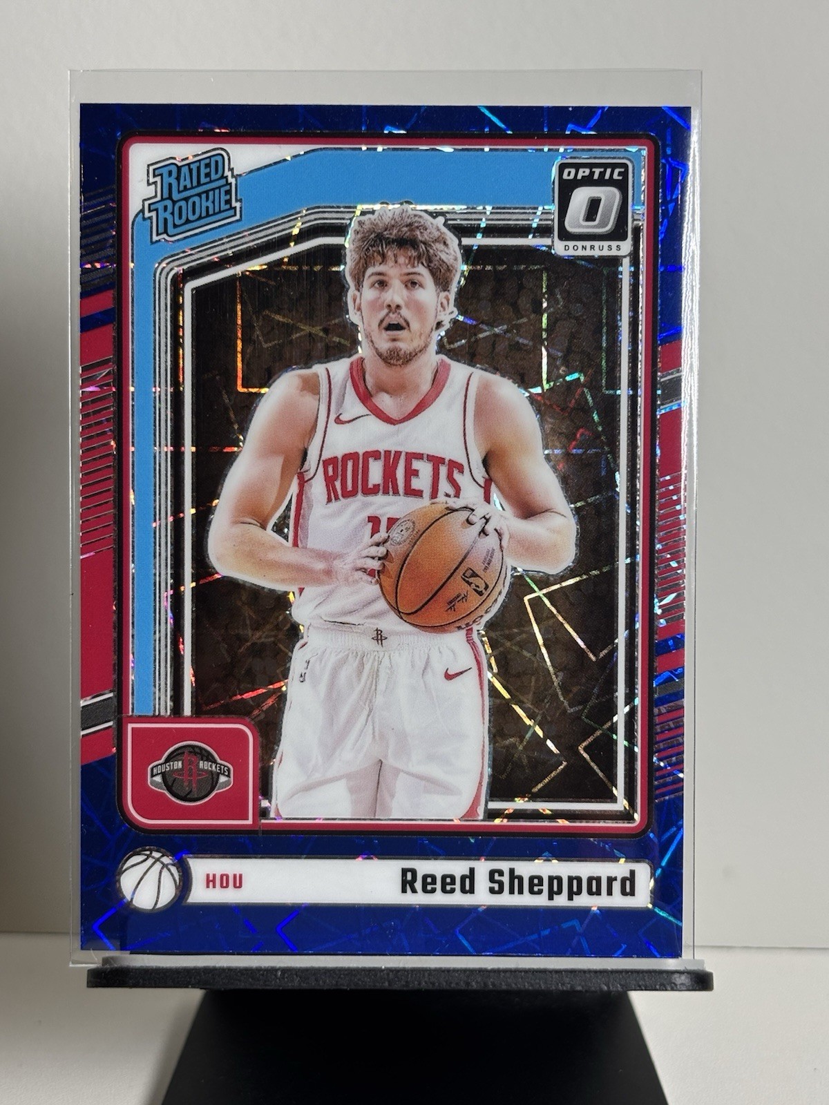 2024-25 Reed Sheppard Optic Rated Rookie Blue Velocity #255 (RC) Houston Rockets
