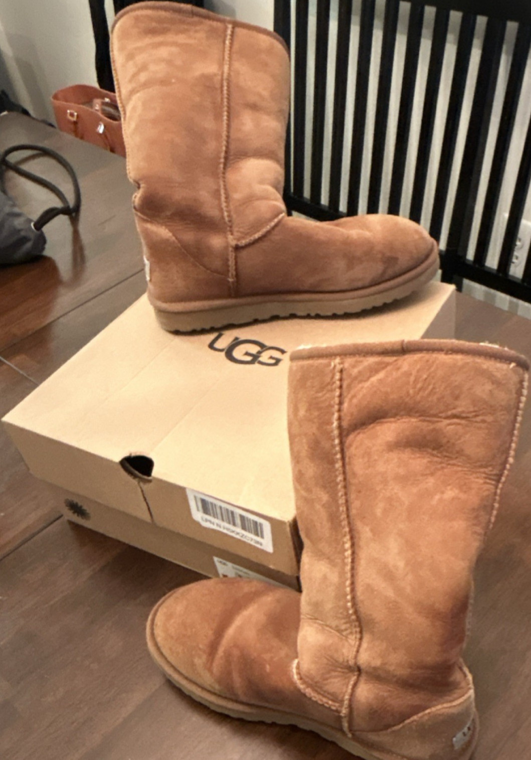 C hestnut brown UGG Classic Tall II suede boots