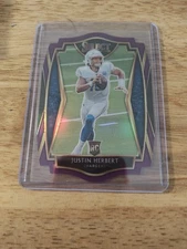 2020 Panini Select - Premier Level Justin Herbert #144 Purple Prizm Die-Cut (RC)