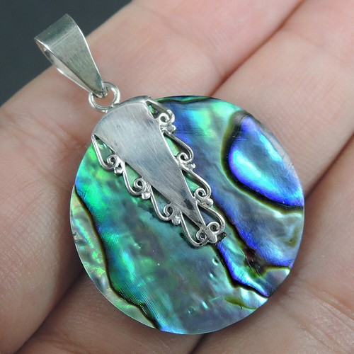 Une Seule Pièce De Pendentif Coquille D'ormeau De Forme Arrondie