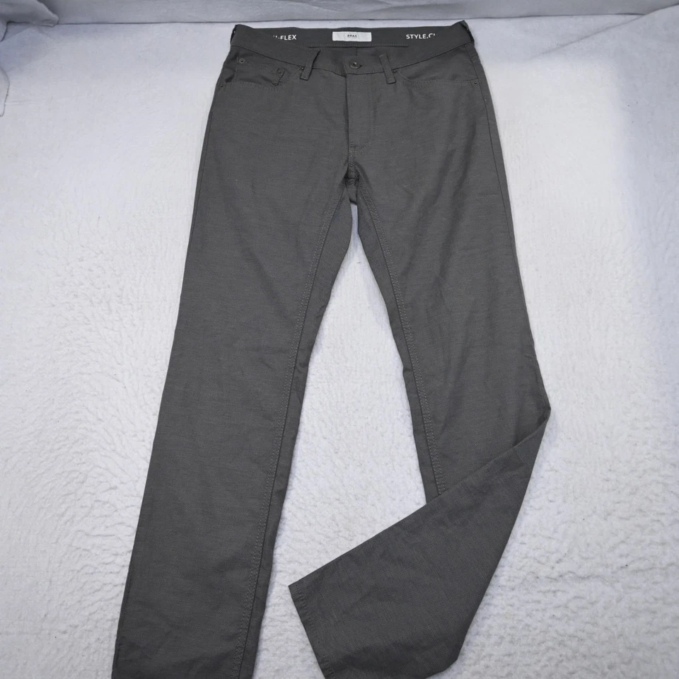 Pantalones chinos Brax Chuck Hi Flex delanteros planos elásticos grises para hombre talla 32 x 34 Foto 2 de 4