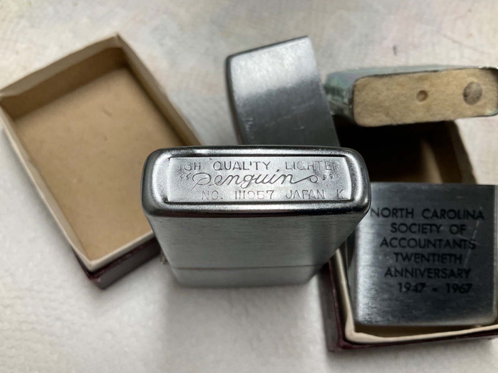 Two vintage Penguin cigarette lighters from 1967...unused..111957