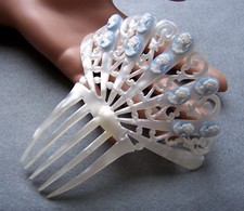 A pretty Art Deco pearlized effect hair comb embellished with cameos