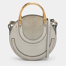 Borsa a tracolla rotonda piccola Pixie Chloe in pelle grigia e camoscio
