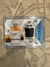 Upper Deck 2021-22 Rookie Materials Jersey Philip Tomasino Rookie Card. rookie card picture