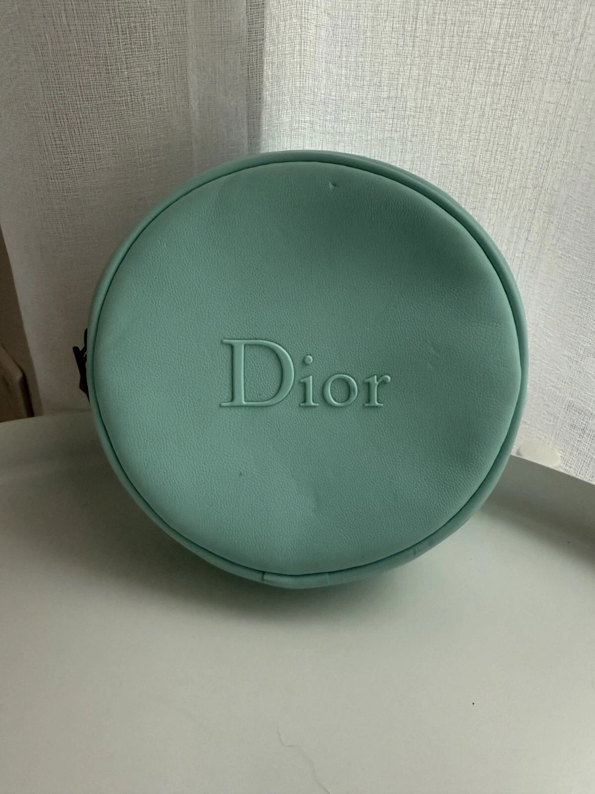 Jolie trousse ronde turquoise Dior Neuve