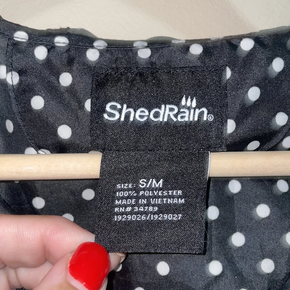 Chaqueta de Lluvia Shed S/M Lunares Blanco y Negro Con Capucha Cintura Elástica Bolsillos con Cremallera Foto 3 de 3