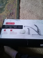 Delta Foundations Single-Handle Standard Kitchen Faucet w/Side Sprayer in Chrome