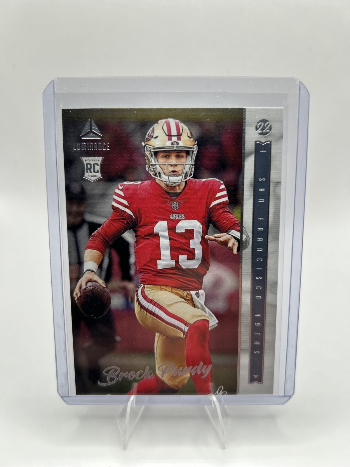 2022 Panini Chronicles - Luminance Update Rookies Brock Purdy #213 (RC)