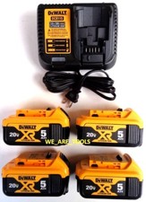  4 Dewalt 20V DCB205 5.0 AH Batteries, 1 DCB115 Charger 20 Volt
