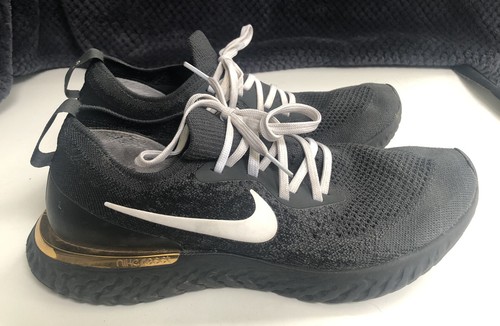 nike epic react black gold