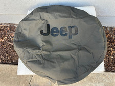 Genuine Jeep Wrangler Cherokee NOS OEM NEW rear tailgate tire cover 82207956AC