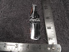 Coca-Cola Magnet made like a Old Bottle out of Alunimum,